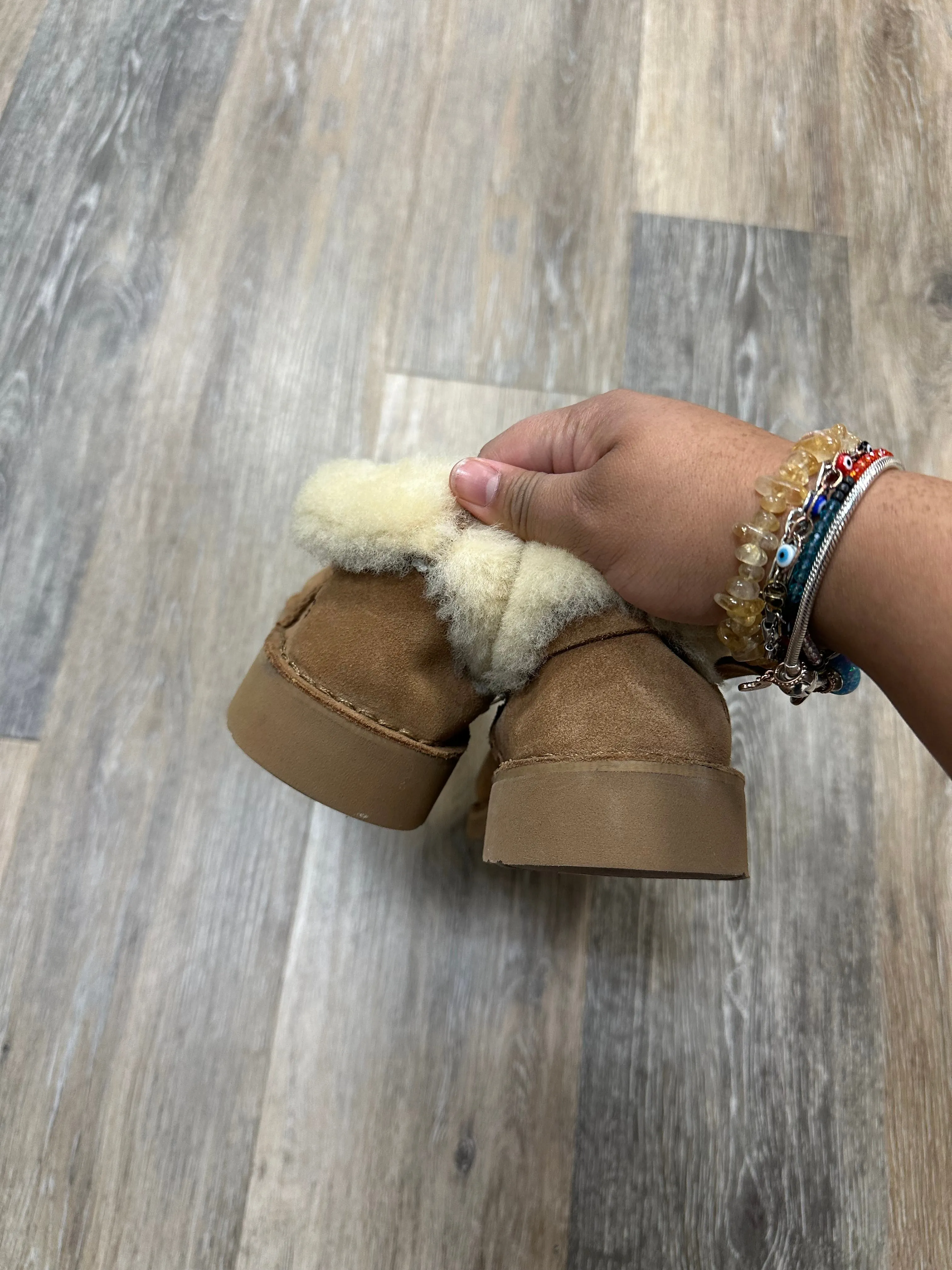 Boots Designer By Ugg In Tan, Size: 7
